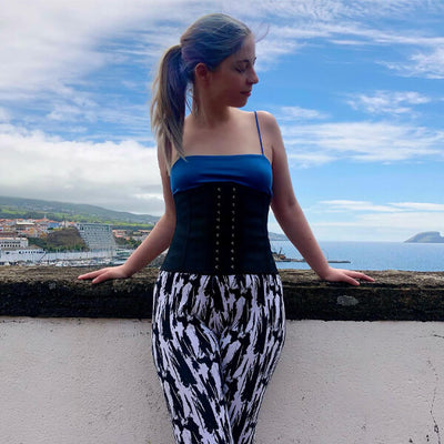 When wearing corsets, are you forced to perch rather than sit?